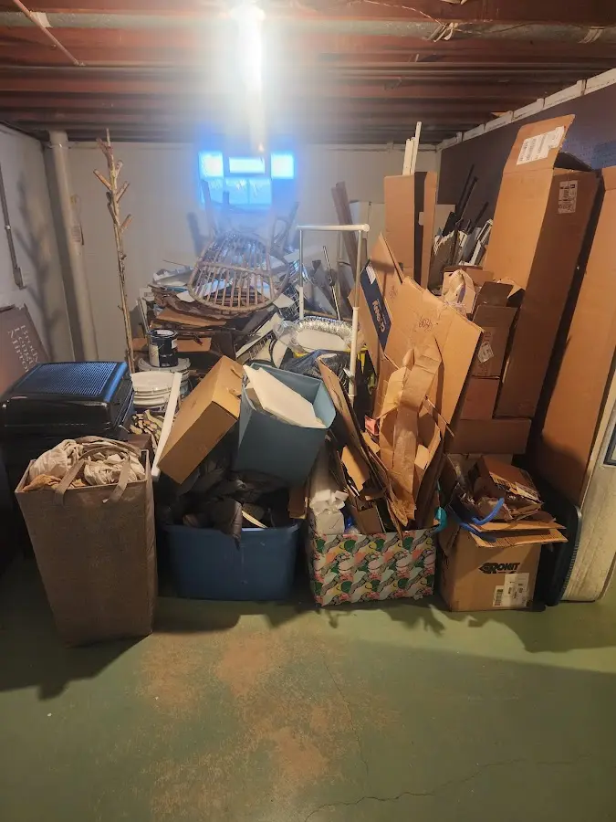 Roll-off dumpster container at job site for 2 Yard Dumpster Rental in Phoenix Lake